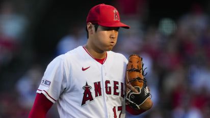 Shohei Ohtani goes seven innings and strikes out 12 batters against the  Dodgers 