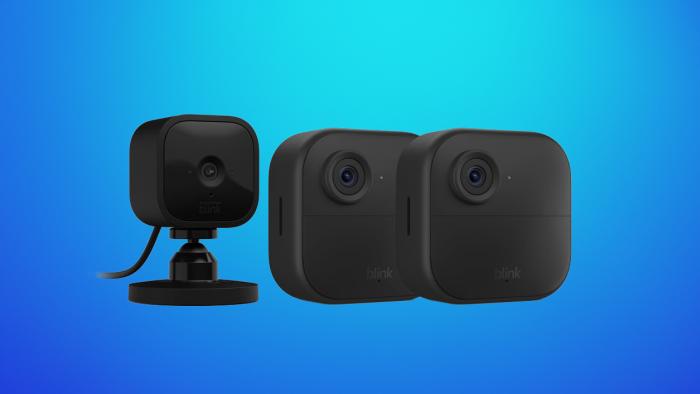 Product image of a Blink Mini camera next to two Blink Outdoor 4 cameras. Blue gradient background