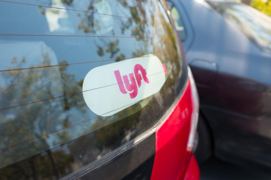 Sticker for Lyft on the back of a Lyft ride sharing vehicle in the Silicon Valley town of Santa Clara, California, August 17, 2017. (Photo via Smith Collection/Gado/Getty Images).
