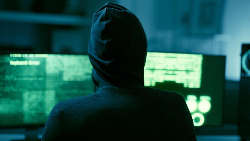 Hacker, IT and person with code on computer, programming and phishing scam with malware or virus. Hacking, system glitch and cloud computing error in dark room, cyber crime and cybersecurity fail