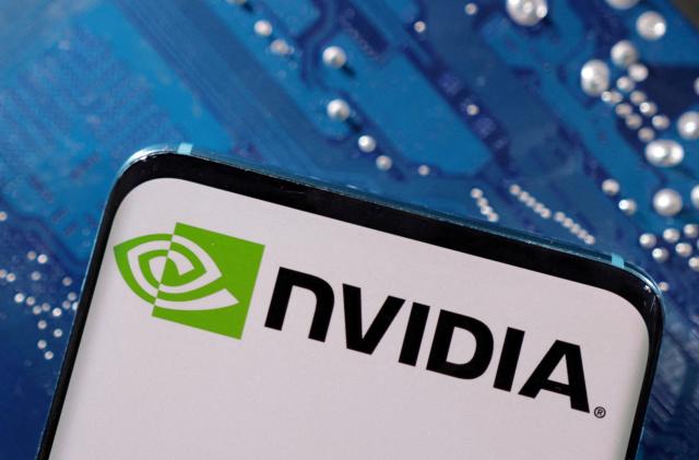 FILE PHOTO: A smartphone with a displayed NVIDIA logo is placed on a computer motherboard in this illustration taken March 6, 2023. REUTERS/Dado Ruvic/Illustration/File Photo