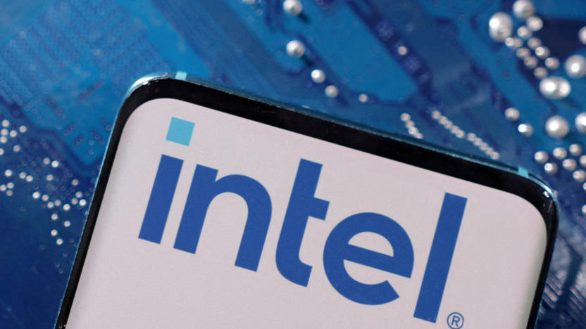 A smartphone with a displayed Intel logo is placed on a computer motherboard in this illustration taken March 6, 2023. REUTERS/Dado Ruvic/Illustration/File Photo