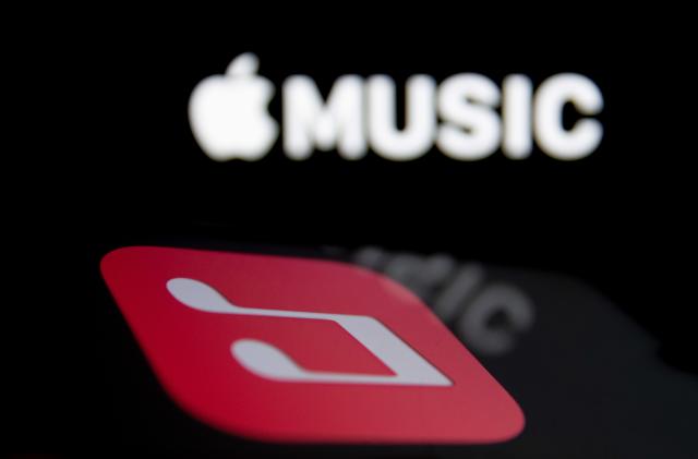 In this photo illustration Apple Music App logo is displayed on a smartphone screen in Athens, Greece on April 16, 2021. (Photo by Nikolas Kokovlis/NurPhoto via Getty Images)