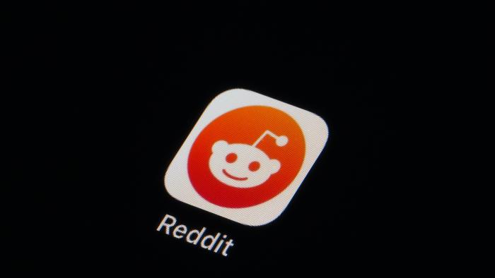 The Reddit app icon is seen on a smartphone, Tuesday, Feb. 28, 2023, in Marple Township, Pa. Reddit is facing an ongoing blackout from some of its most active users. After outrage erupted over plans to charge some third party apps for API, thousands of communities within the online discussion network went dark this week — and many organizers say their protest is not over. (AP Photo/Matt Slocum)