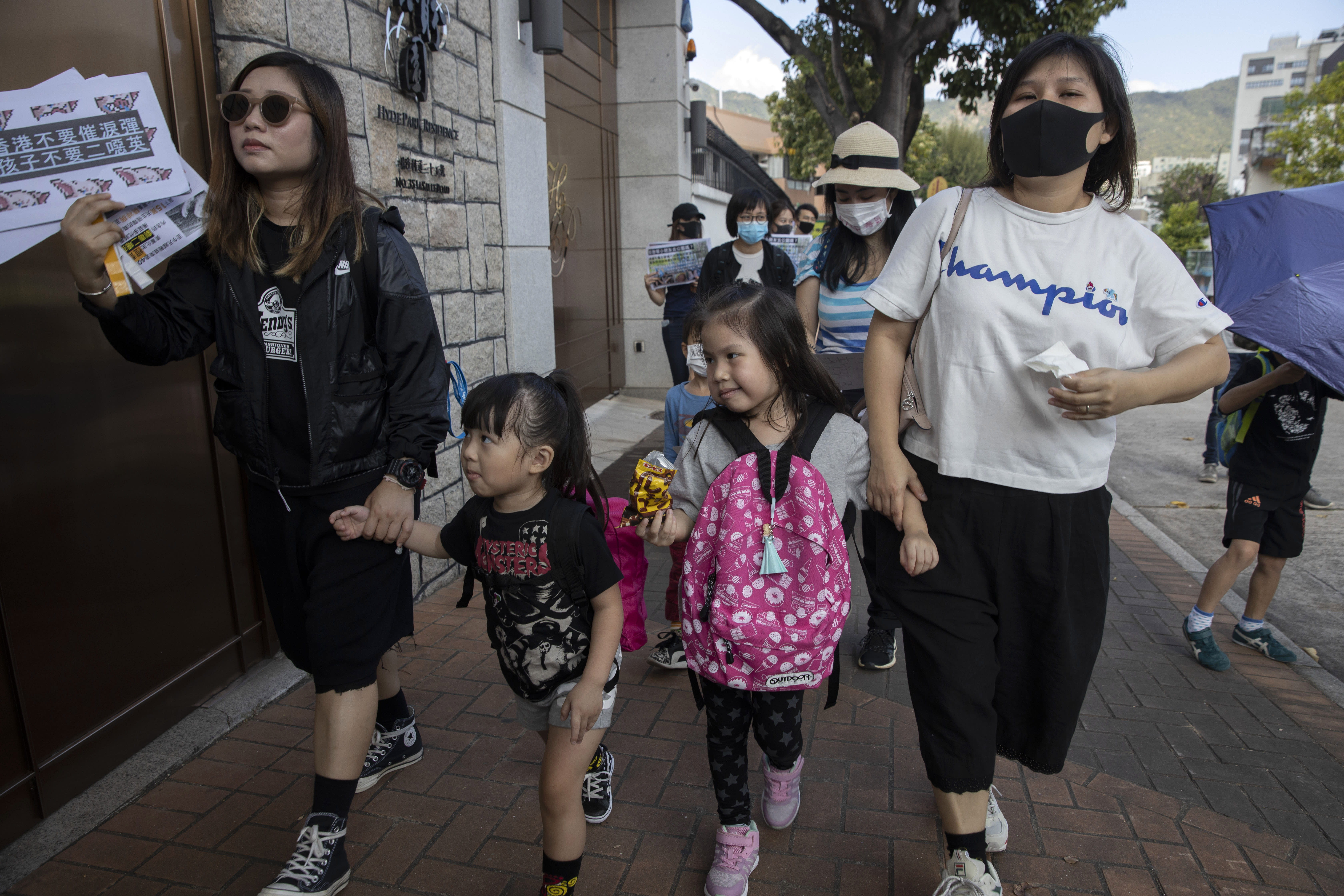 Hong Kong Families Protest Police Use Of Tear Gas 