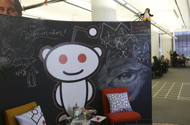 A Reddit mascot is shown at the company's headquarters in San Francisco, California April 15, 2014. Reddit, a website with a retro-'90s look and space-alien mascot that tracks everything from online news to celebrity Q&As, is going after more eyeballs, and advertising, by allowing members of its passionate community to post their own news more quickly and easily. REUTERS/Robert Galbraith  (UNITED STATES - Tags: BUSINESS SCIENCE TECHNOLOGY)