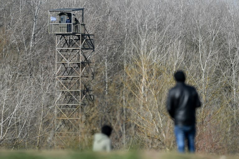 Despite Greece stepping up border patrols, migrants eye up their chances of making it across the river running along the border (AFP Photo/Ozan KOSE)