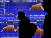 Asia stocks buoyant, yen retreats after BOJ talks down rate hikes