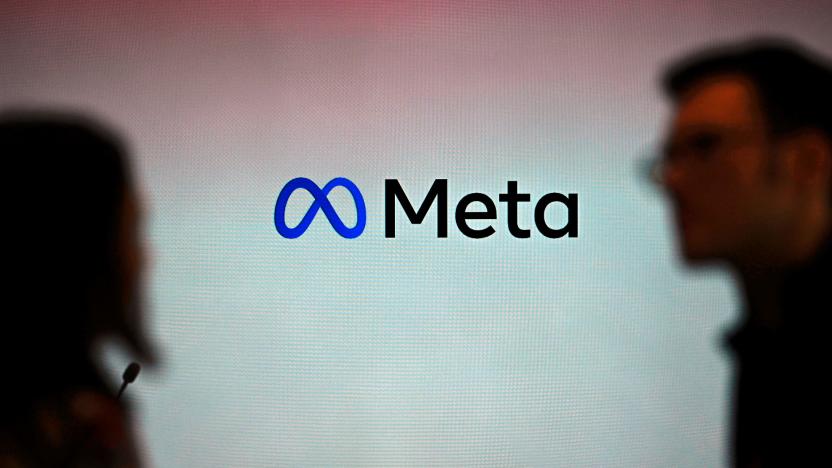 Visitors stand in front of a Meta logo during a launch event at the corporate offices of Meta in Berlin on June 6, 2023. (Photo by Tobias SCHWARZ / AFP) (Photo by TOBIAS SCHWARZ/AFP via Getty Images)