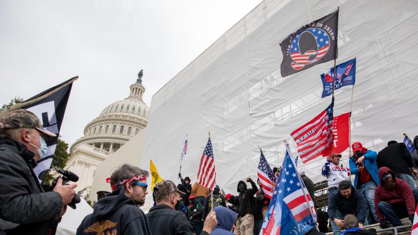 WASHINGTON DC - JANUARY 6: Flags fly near the U.S. Capitol as the perimeter was breached by pro-Trump protestors in Washington, DC on Wednesday, January 6, 2021. (Amanda Andrade-Rhoades/For The Washington Post via Getty Images)