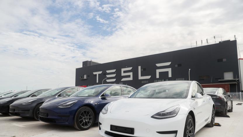 SHANGHAI, Oct. 26, 2020 -- Photo taken on Oct. 26, 2020 shows the Tesla China-made Model 3 vehicles at its gigafactory in Shanghai, east China. U.S. carmaker Tesla announced Monday that it will export 7,000 vehicles of made-in-China Model 3 to Europe on Tuesday.
    The batch of sedans is expected to arrive at the port of Zeebrugge in Belgium by sea at the end of November, before being sold in European countries including Germany, France, Italy, Spain, Portugal and Switzerland.
    Tesla delivered the first batch of made-in-China Model 3 sedans to the public earlier this year, one year after the company broke ground on its first overseas plant. (Photo by Ding Ting/Xinhua via Getty) (Xinhua/Ding Ting via Getty Images)