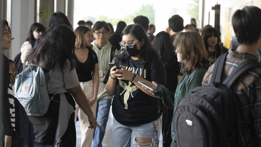 ANAHEIM, CA - August 10: Students mingle before heading to the first day of class following summer recess at Anaheim High School in Anaheim, CA on Wednesday, August 10, 2022. Public high schools will start no earlier than 8:30 a.m. after a new state law went into effect July 1st. (Photo by Paul Bersebach/MediaNews Group/Orange County Register via Getty Images)