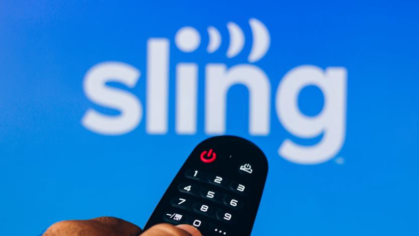 BRAZIL - 2022/02/21: In this photo illustration, a hand holding a TV remote control points to a screen that displays the Sling TV logo. (Photo Illustration by Rafael Henrique/SOPA Images/LightRocket via Getty Images)