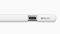 The Apple Pencil stylus with a sliding cap that reveals a USB-C port.