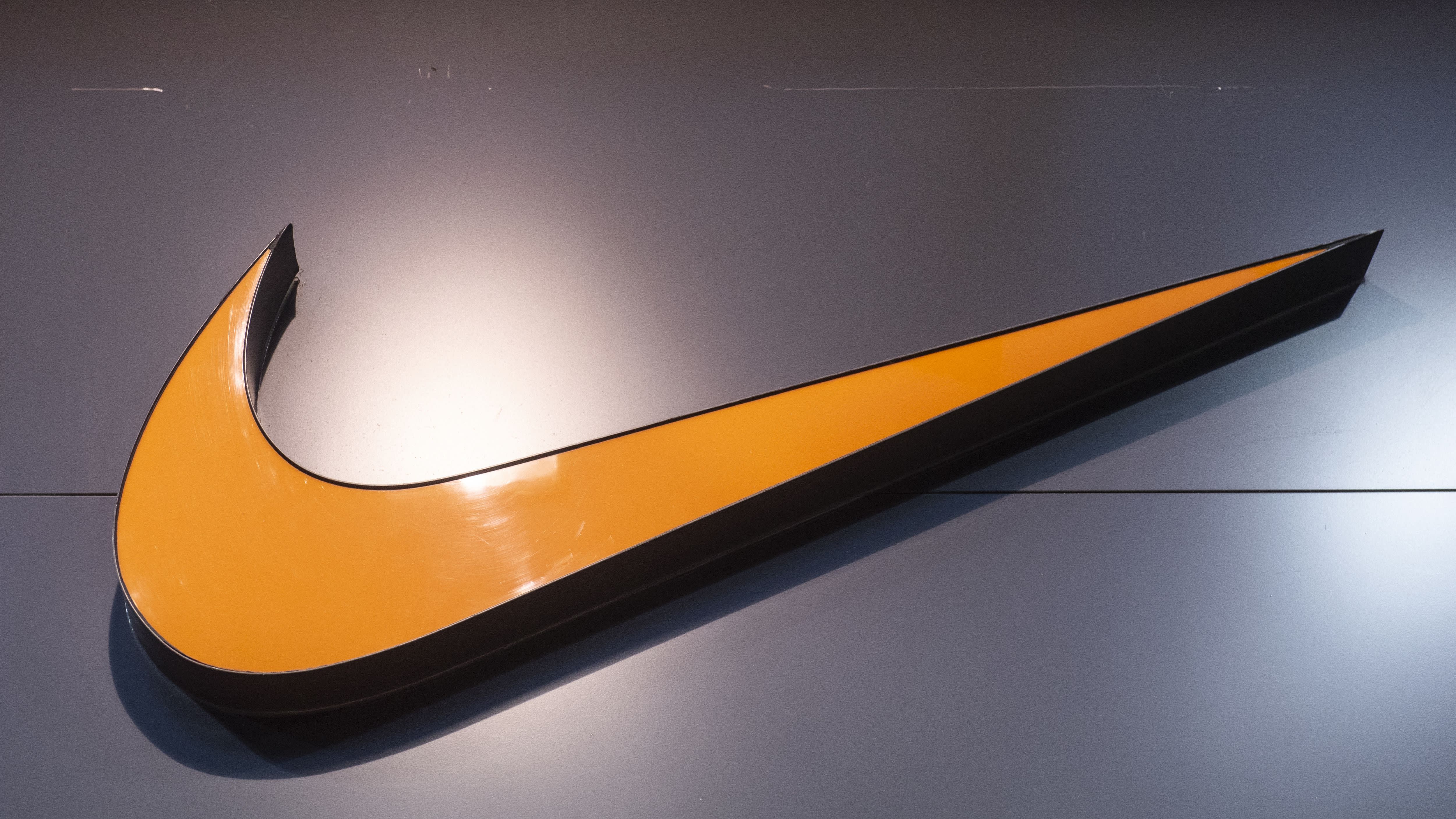 orange nike logo wallpaper