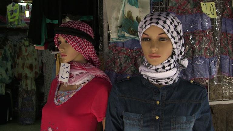 Palestinian scarf resists Chinese rivals in Hebron - Taipei Times