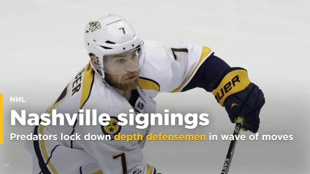 Predators lock down depth defensemen in wave of moves