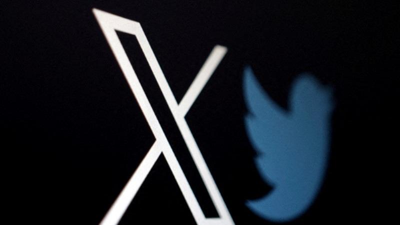 FILE PHOTO: The logo of social media platform X, formerly Twitter, is seen alongside the former logo in this illustration taken, July 24, 2023. REUTERS/Dado Ruvic/Illustration/File Photo