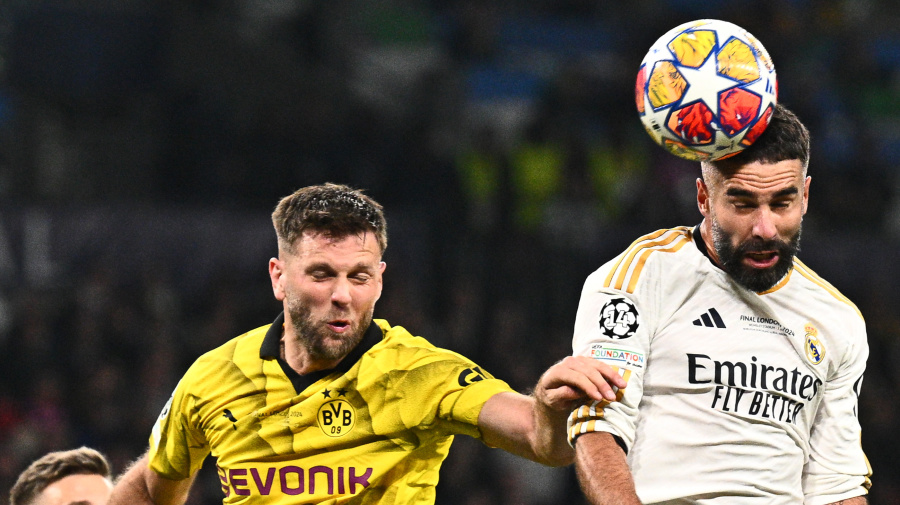 Getty Images - 01 June 2024, Great Britain, London: Soccer: Champions League, Borussia Dortmund - Real Madrid, knockout round, final at Wembley Stadium, Madrid's Dani Carvajal (r) scores the goal alongside Dortmund's Niclas Füllkrug to make it 0:1. Photo: Tom Weller/dpa (Photo by Tom Weller/picture alliance via Getty Images)
