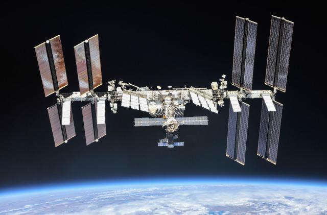 Photo of the International Space Station (ISS) floating above Earth.