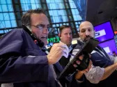 Stocks open lower, Wall Street's 'fear gauge' dips below 25