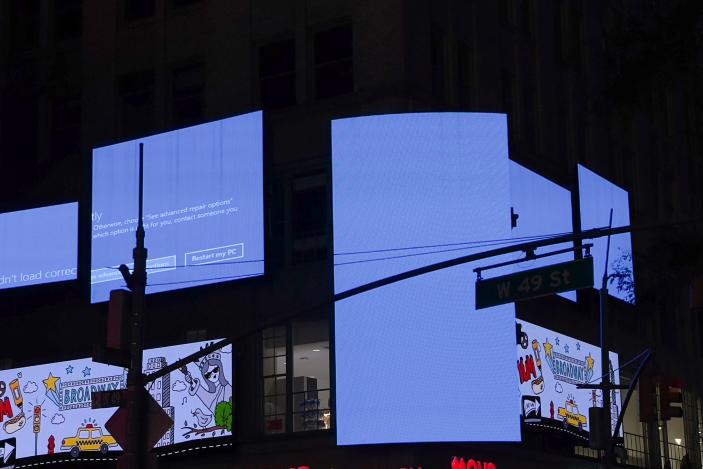 NEW YORK, US - JULY 19: Digital boards are seen due to the global communications outage caused by CrowdStrike, which provides cyber security services to US technology company Microsoft, it was observed that some digital billboards in Times Square in New York City, United States, displayed a blue screen and some screens went completely black on July on 19, 2024. (Photo by Selcuk Acar/Anadolu via Getty Images)