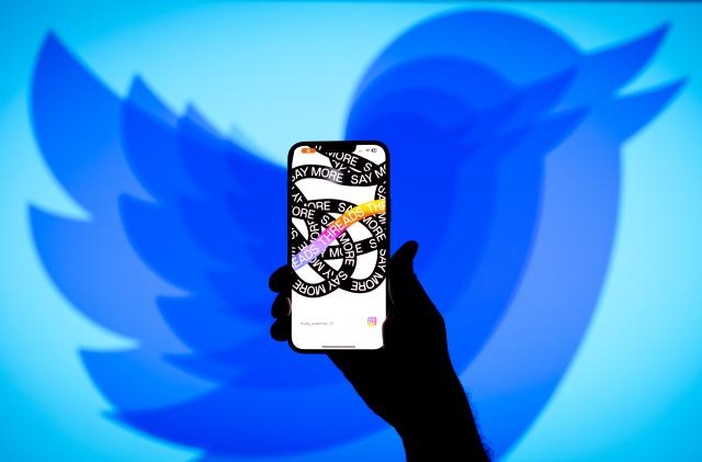 The Instagram Threads app is seen on a phone with a Twitter logo in the background in this illustration photo on 06 July, 2023 in Warsaw, Poland. (Photo by Jaap Arriens/NurPhoto via Getty Images)