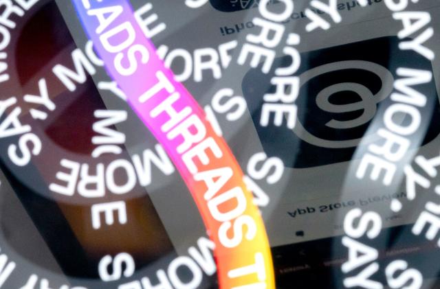 This photo illustration created  in Washington, DC, on July 6, 2023, shows the logo for Threads, an Instagram app, reflected in its opening page. More than 10 million people have signed up to Threads, Meta's rival to Twitter, within the first few hours of its launch, the company's CEO Mark Zuckerberg said July 6. The app went live on Apple and Android app stores in 100 countries at 2300 GMT on July 5, 2023, and will run with no ads for now, but its release in Europe has been delayed over data privacy concerns. (Photo by Stefani Reynolds / AFP) (Photo by STEFANI REYNOLDS/AFP via Getty Images)