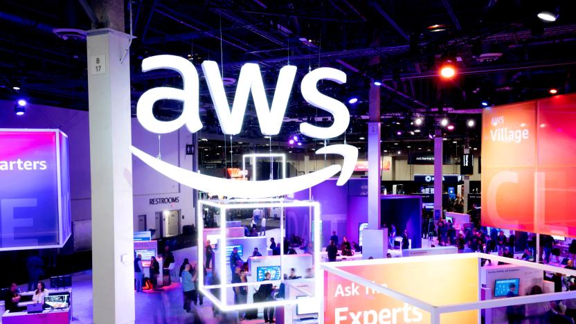 Attendees walk through an expo hall at AWS re:Invent 2022, a conference hosted by Amazon Web Services (AWS), in Las Vegas, Nevada, U.S., November 30, 2022. Noah Berger/AWS/Handout via REUTERS THIS IMAGE HAS BEEN SUPPLIED BY A THIRD PARTY. MANDATORY CREDIT