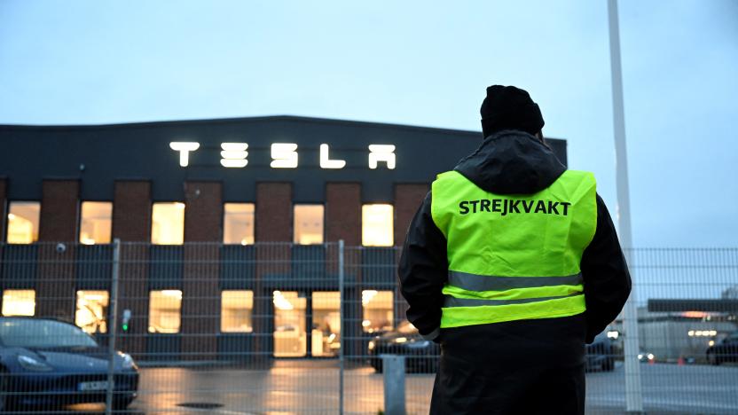 Emma Hansson, chairman of IF Metall Stockholms län stands in front of the electric car company Tesla's Service Center in Segeltorp, south of Stockholm, as workers strike for the signing of a collective agreement on October 27, 2023. (Photo by Jessica Gow/TT / TT NEWS AGENCY / AFP) / Sweden OUT (Photo by JESSICA GOW/TT/TT NEWS AGENCY/AFP via Getty Images)