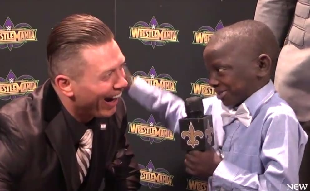 This Tiny Fan Interviewing WWE Superstars Is Exactly What Your Heart Needs Right Now