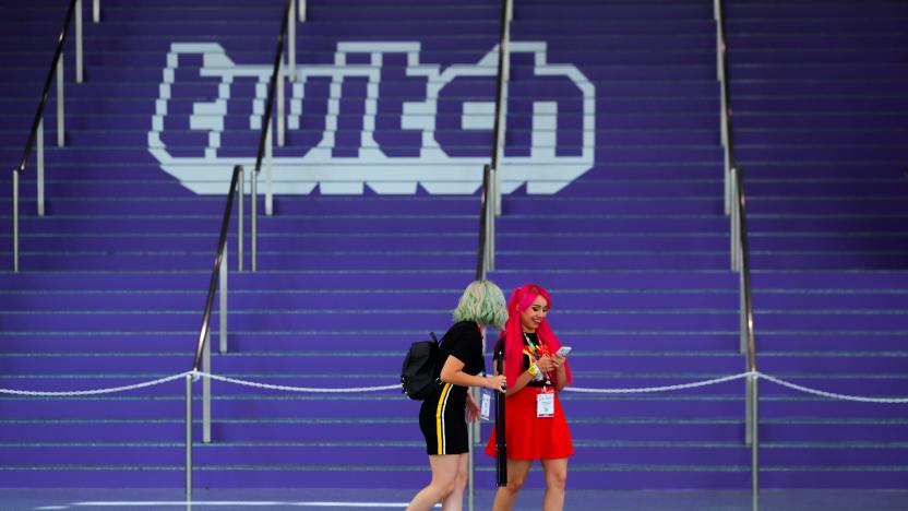 Attendees walk past a Twitch logo painted on stairs during opening day of E3, the annual video games expo revealing the latest in gaming software and hardware in Los Angeles, California, U.S., June 11, 2019.  REUTERS/Mike Blake