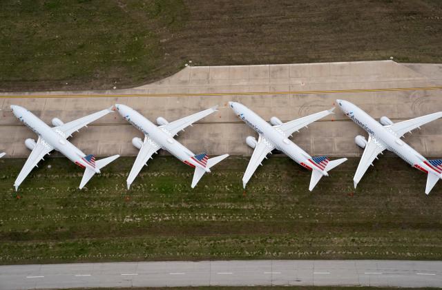 American Airlines 737 max passenger planes are parked on the tarmac at Tulsa International Airport in Tulsa, Oklahoma, U.S. March 23, 2020. REUTERS/Nick Oxford TPX IMAGES OF THE DAY REFILE - CORRECTING PLANE MODEL AND SLUG, REMOVING REFERENCE TO CORONAVIRUS