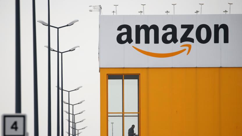 The logo of Amazon is seen at the company logistics center in Lauwin-Planque, northern France, March 19, 2020. Several hundred employees protested in France, calling on the U.S. e-commerce giant to halt operations or make it easier for employees to stay away during the coronavirus (COVID-19) epidemic. REUTERS/Pascal Rossignol