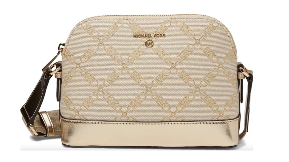 You should definitely buy this metallic Michael Kors crossbody bag while  it's under $100 for Prime Day