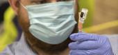 A medical student prepares a dose of Johnson & Johnson COVID-19 vaccine. (Phil Long/AP)