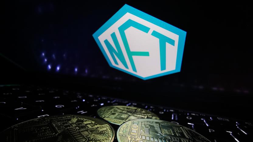 NFT logo displayed on a laptop screen and representation of cryptocurrencies are seen in this illustration photo taken in Krakow, Poland on August 26, 2021. (Photo by Jakub Porzycki/NurPhoto via Getty Images)