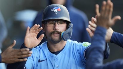 Associated Press - Toronto Blue Jays' Davis Schneider celebrates after scoring on a single by Bo Bichette during the third inning of a baseball game against the Chicago White Sox, Wednesday, May 29, 2024, in Chicago. (AP Photo/Erin Hooley)