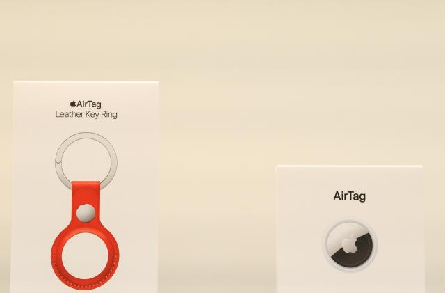 SYDNEY, AUSTRALIA - APRIL 30: Accessories on display next to an AirTag for the launch of the new Apple Air Tag at the Apple Store George Street on April 30, 2021 in Sydney, Australia. Apple's latest accessory, the AirTag is a small device that helps people keep track of belongings, using Apple's Find My network to locate lost items like keys, wallet, or a bag. (Photo by James D. Morgan/Getty Images)