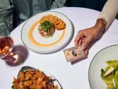 To Enhance Dining Platform, American Express Enters Agreement to Acquire Tock from Squarespace; Also Agrees to Acquire Rooam