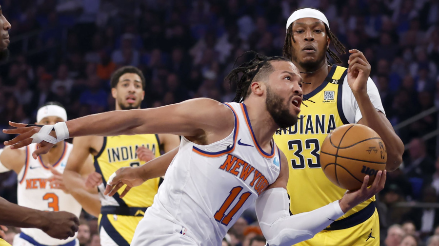 Getty Images - NEW YORK, NEW YORK - MAY 06: Jalen Brunson #11 of the New York Knicks drives past Aaron Nesmith #23 and Myles Turner #33 of the Indiana Pacers during the first quarter in Game One of the Eastern Conference Second Round Playoffs at Madison Square Garden on May 06, 2024 in New York City. NOTE TO USER: User expressly acknowledges and agrees that, by downloading and or using this photograph, User is consenting to the terms and conditions of the Getty Images License Agreement. (Photo by Sarah Stier/Getty Images)