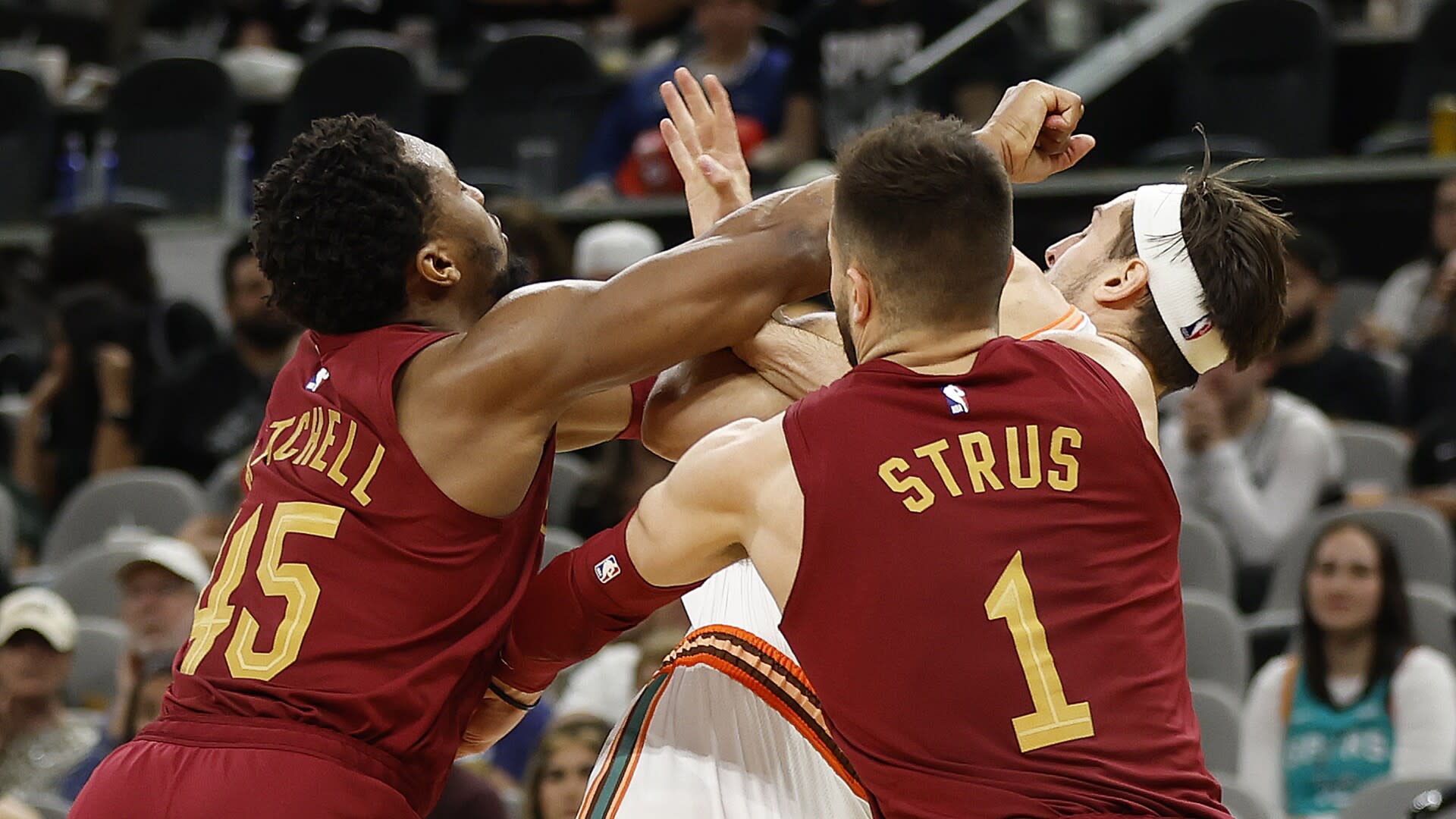 Watch Donovan Mitchell go after Zach Collins, both get ejected near end of Cavaliers win