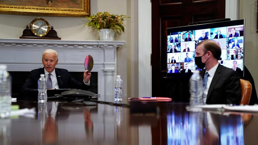 WASHINGTON, DC - APRIL 12: U.S. President Joe Biden joins a CEO Summit on Semiconductor and Supply Chain Resilience via video conference with National Security Advisor Jake Sullivan from the Roosevelt Room at the White House on April 12, 2021 in Washington, DC. President Biden joined the summit which focused on the global shortage of semiconductors -- computer chips that run everything from televisions and mobile phones to cars and games consoles --  caused by the ongoing coronavirus (COVID-19) pandemic. (Photo by Amr Alfiky-Pool/Getty Images)