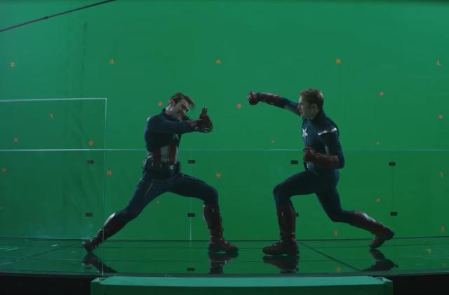 Behind-the-scenes shot of Avengers: Engdgame showing Chris Evans (Captain America) and a stud double posing against a green screen.