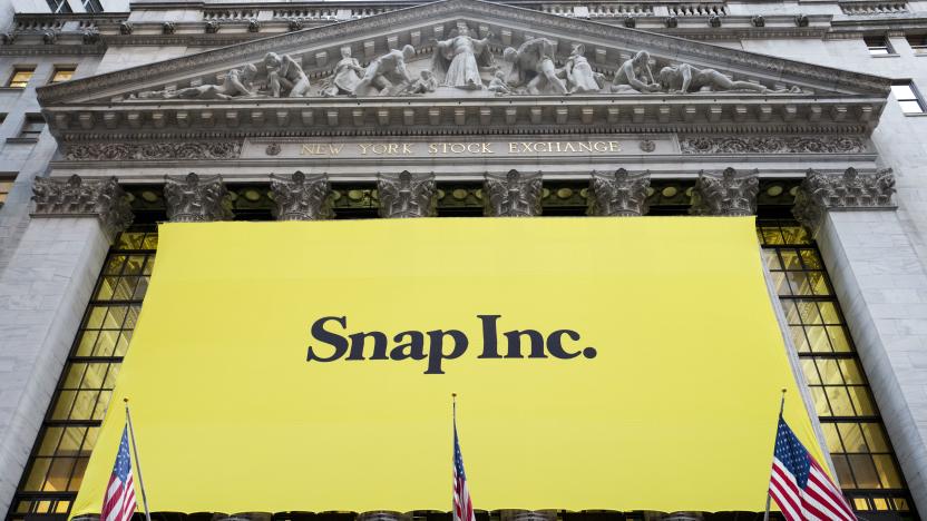 A banner for Snap Inc. hangs from the front of the New York Stock Exchange, Thursday, March 2, 2017, in New York. The company behind the popular messaging app Snapchat is expected to start trading Thursday after a better-than-expected stock offering. (AP Photo/Mark Lennihan)