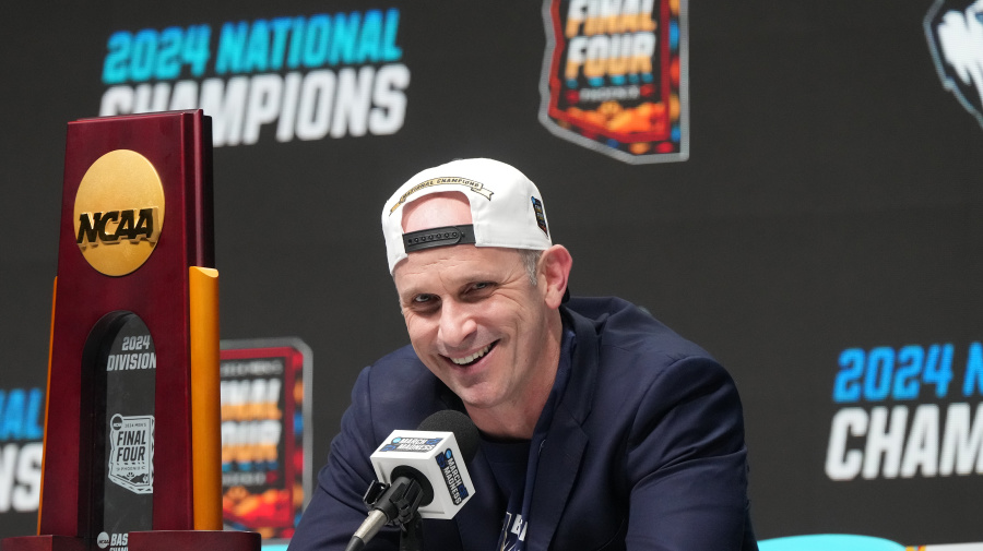 Getty Images - GLENDALE, ARIZONA - APRIL 08:  Head coach Dan Hurley of the Connecticut Huskies addresses the media after the National College Basketball Championship game against the Purdue Boilermakers at State Farm Stadium on April 08, 2024 in Glendale, Arizona.  (Photo by Mitchell Layton/Getty Images)