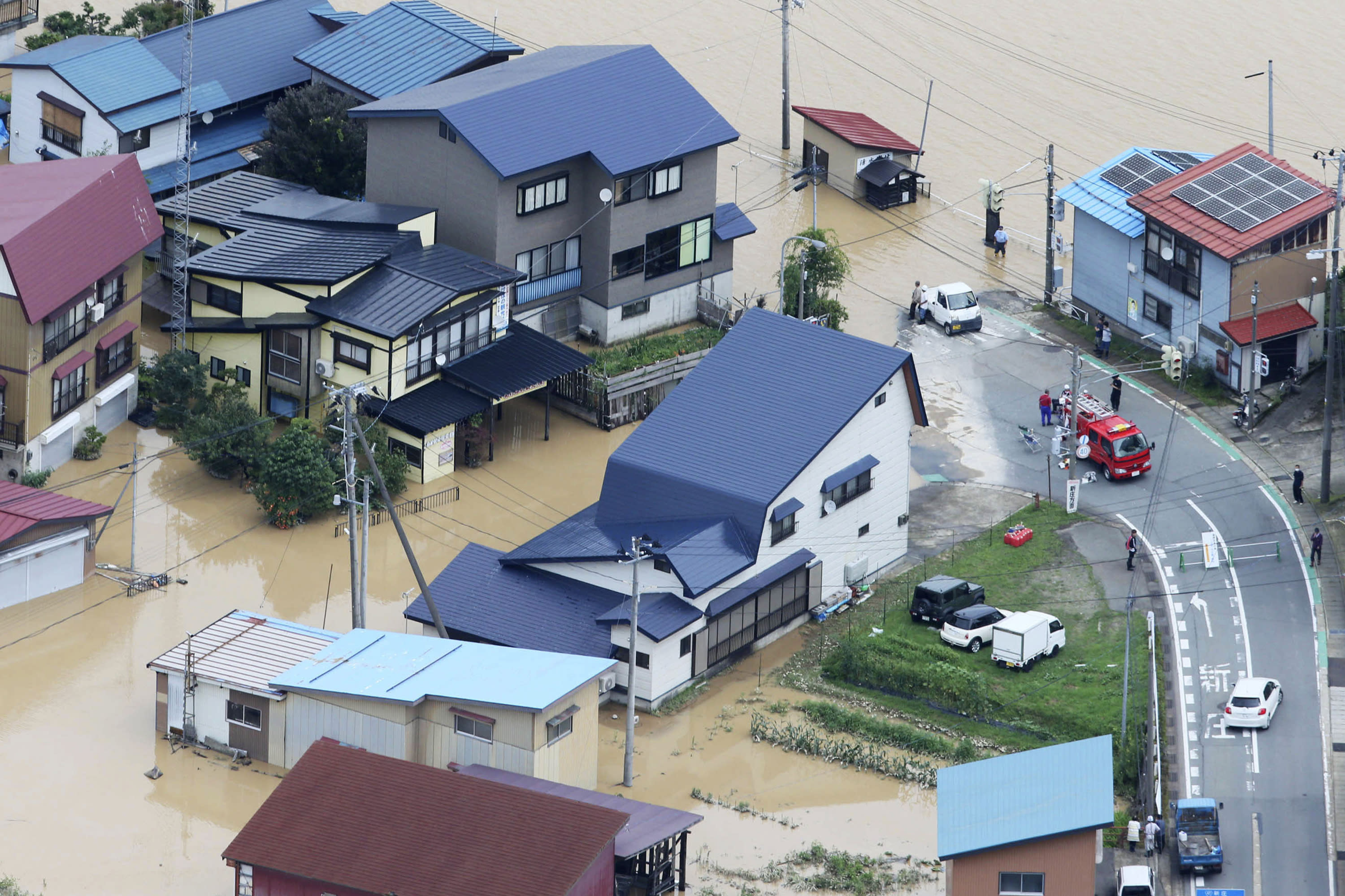 Flooding, mudslides hit northern Japan after heavy rainfall