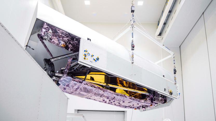 Engineers unpack, clean and prepare the James Webb Space Telescope ahead of its scheduled launch into orbit, upon its arrival at the launch site in Kourou, French Guiana, as seen in this NASA image released on November 2, 2021 and obtained by Reuters on December 13, 2021. NASA/Chris Gunn/Handout via REUTERS  THIS IMAGE HAS BEEN SUPPLIED BY A THIRD PARTY.