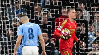 Getty Images - Manchester City's Croatian midfielder #08 Mateo Kovacic reacts after having his penalty kick saved during the penalty shootout during the UEFA Champions League quarter-final second-leg football match between Manchester City and Real Madrid, at the Etihad Stadium, in Manchester, north-west England, on April 17, 2024. (Photo by Paul ELLIS / AFP) (Photo by PAUL ELLIS/AFP via Getty Images)