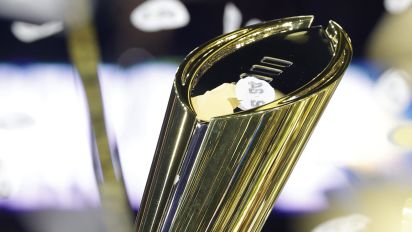 Getty Images - HOUSTON, TEXAS - JANUARY 08: A detail of the College Football Playoff National Championship Trophy after the Michigan Wolverines defeated the Washington Huskies 34-13 in the 2024 CFP National Championship game at NRG Stadium on January 08, 2024 in Houston, Texas. (Photo by Carmen Mandato/Getty Images)